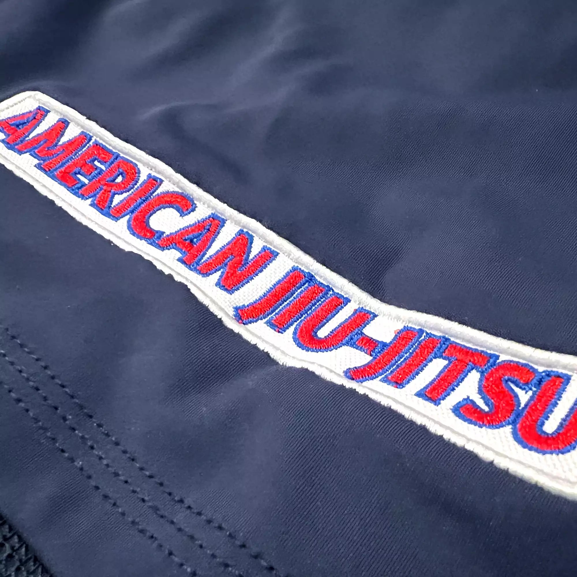 GRW American jiu jitsu BJJ Fight Shorts AJJ patch closeup